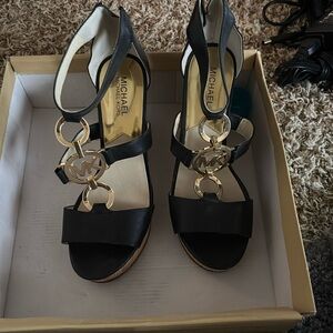 MK wedges 
Like new worn once.
Comes from smoke free home